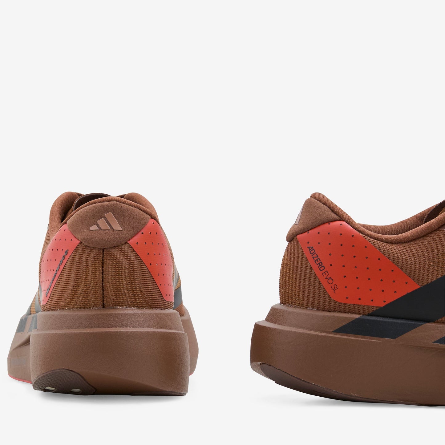 Pharrell Williams x Humanrace Adizero Evo SL Preloved Brown | Core Black | Craft Chili
