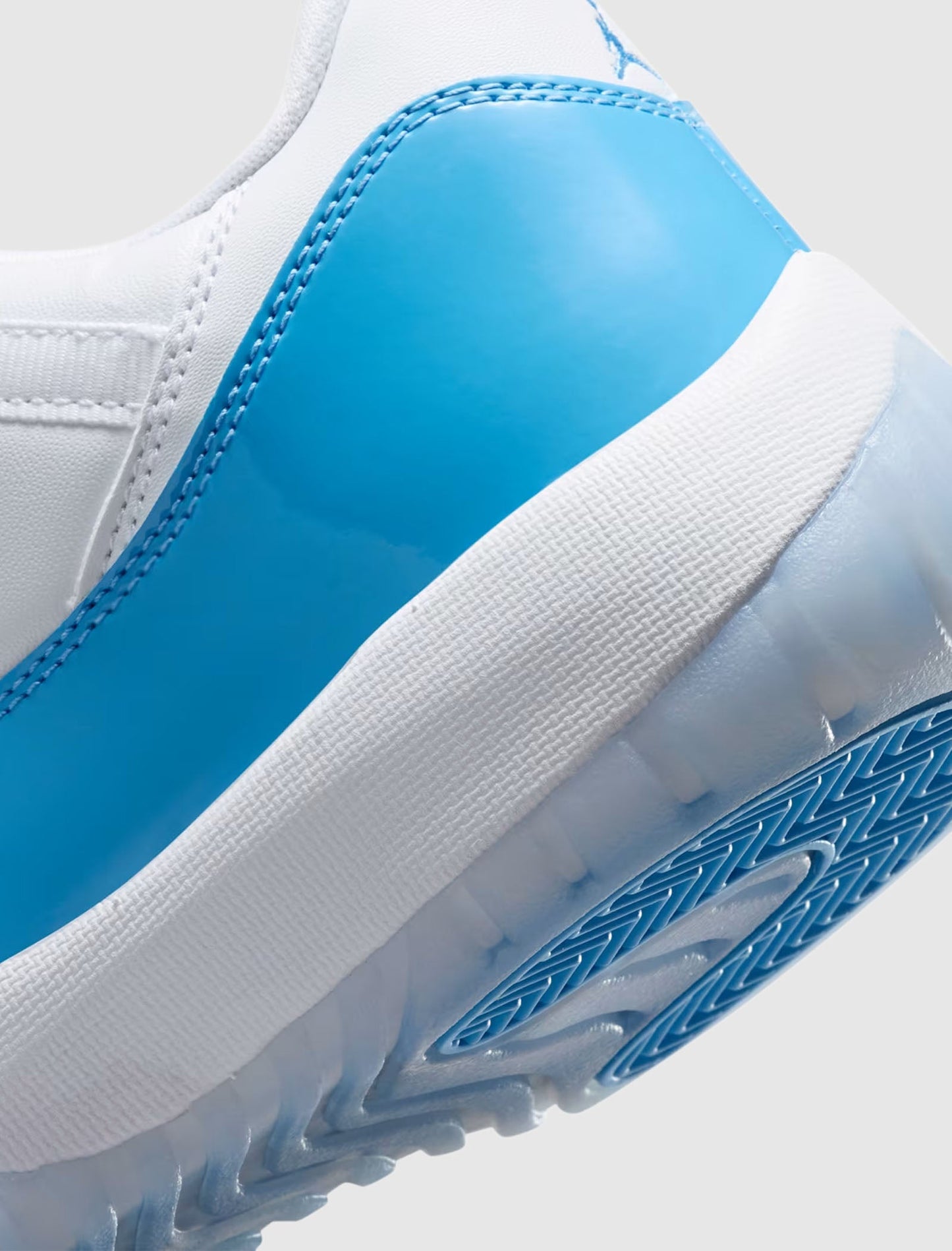 AIR JORDAN 11 RETRO LOW "WHITE/UNIVERSITY BLUE/BLACK"