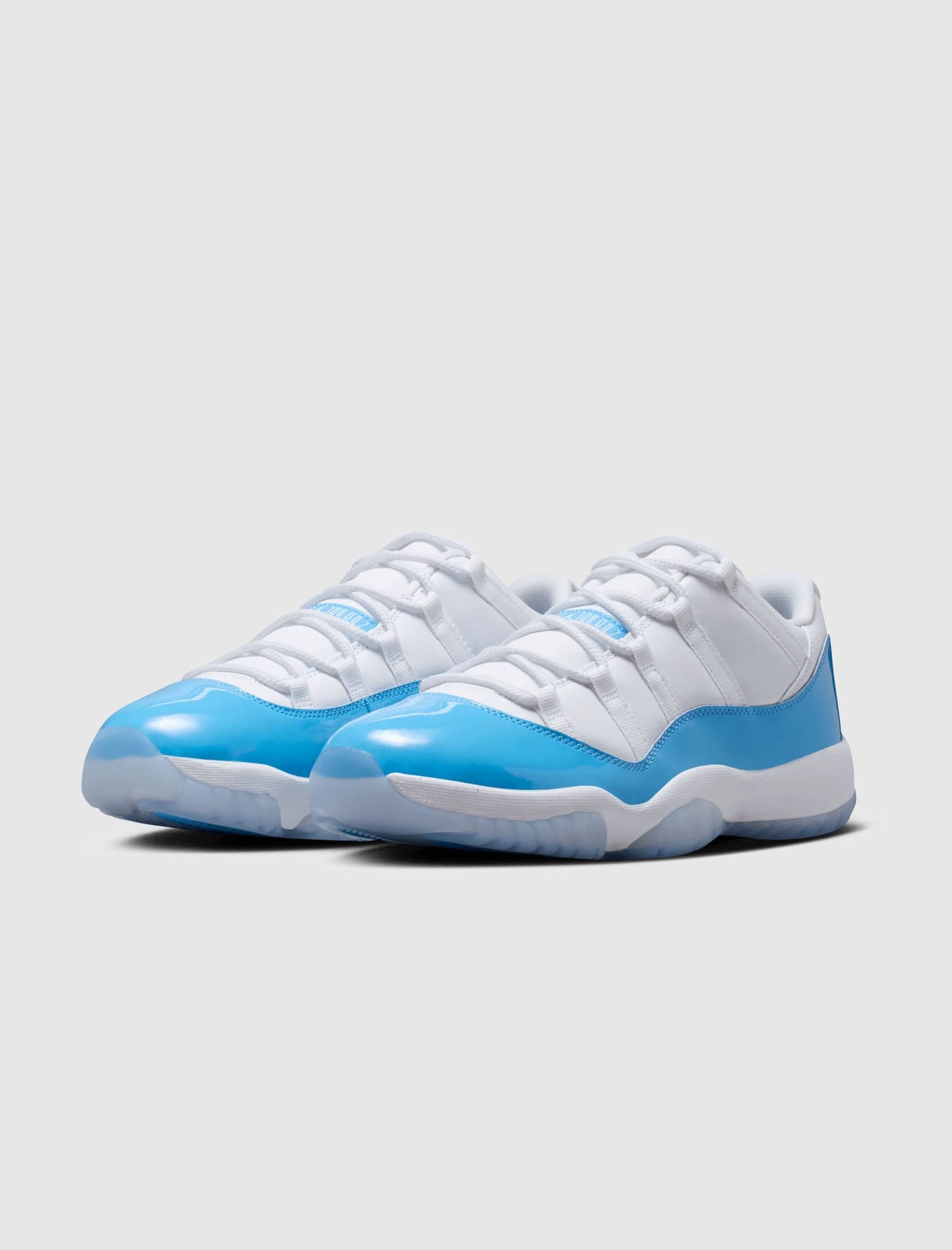 AIR JORDAN 11 RETRO LOW "WHITE/UNIVERSITY BLUE/BLACK"