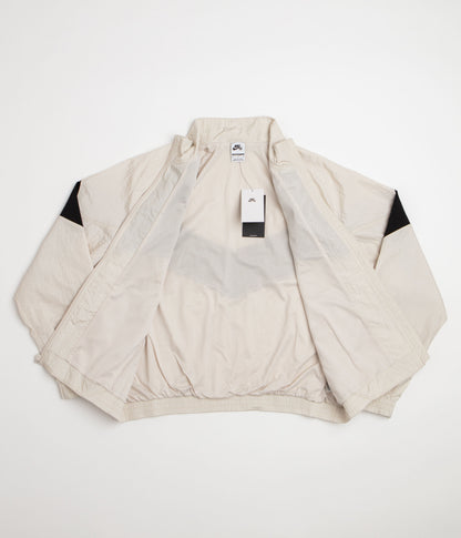 Nike SB Pavan Track Jacket - Light Orewood Brown / Black / Black / White